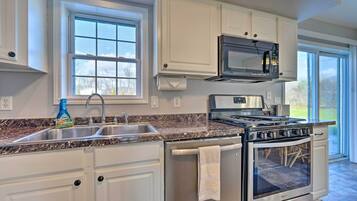 Casa (4 Bedrooms) | Cocina privada | Microondas, horno, parrilla de estufa y lavavajillas