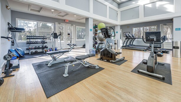 A gym with cardio machines, weight stations, and dumbbells. - Golf Course Home w/ Balcony in North Myrtle Beach! (North Myrtle Beach)