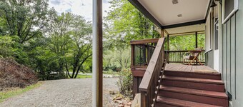 Relaxing Sylva Riverfront Retreat Pet-friendly