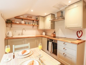 Fridge, electric kettle, toaster, cookware/dishes/utensils
