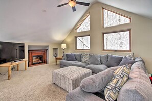 TV, fireplace, books