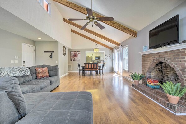 Cottage (2 Bedrooms) | Living area | TV, books - Lake Retreat in Carolina Trace w/ Resort Amenities (Sanford)