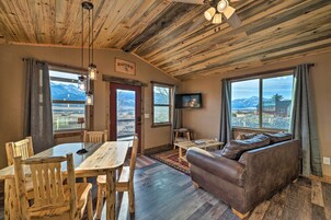 House (1 Bedroom) | Living area | TV, books