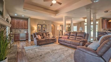 TV, fireplace, books