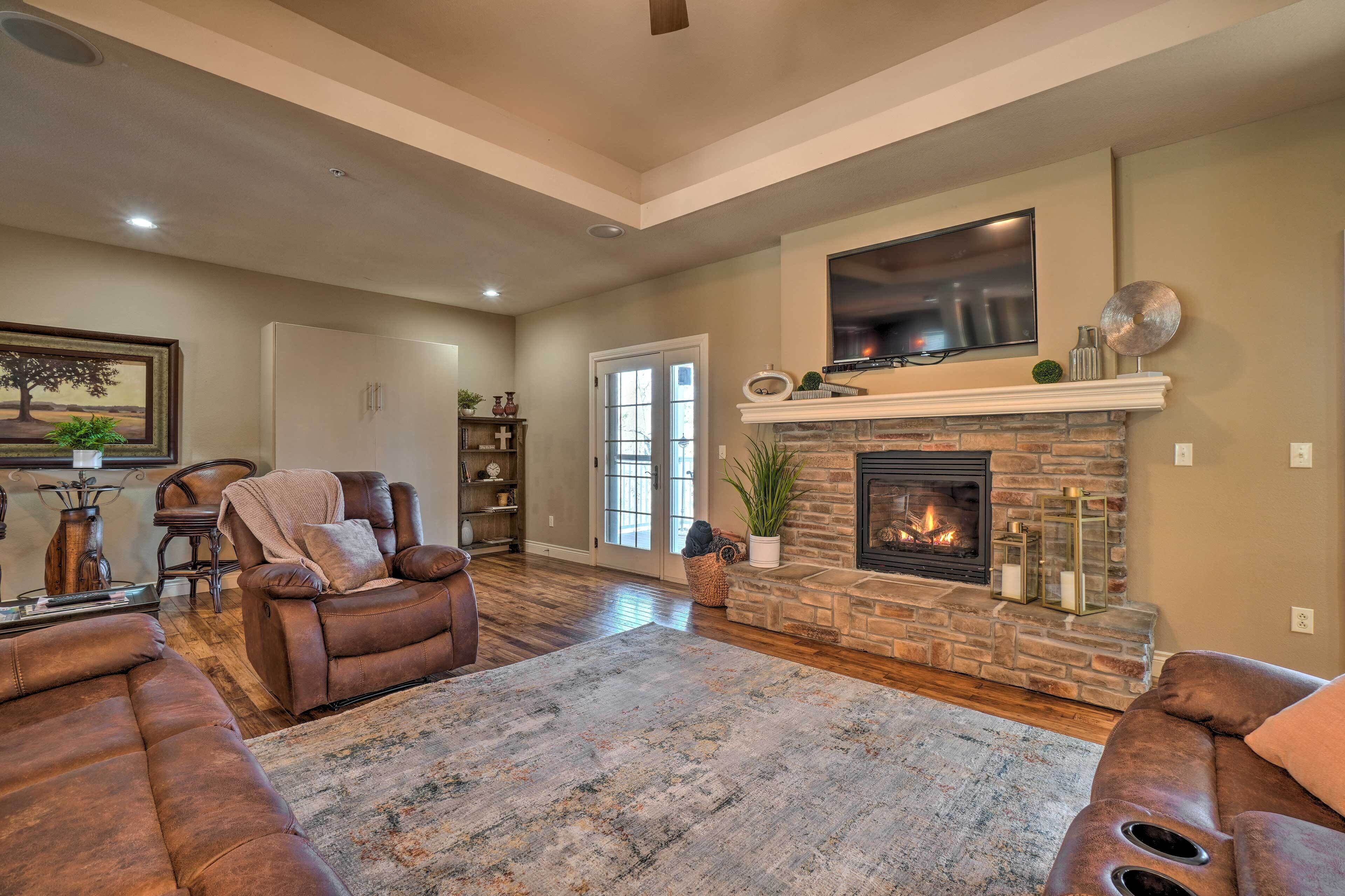 TV, fireplace, books