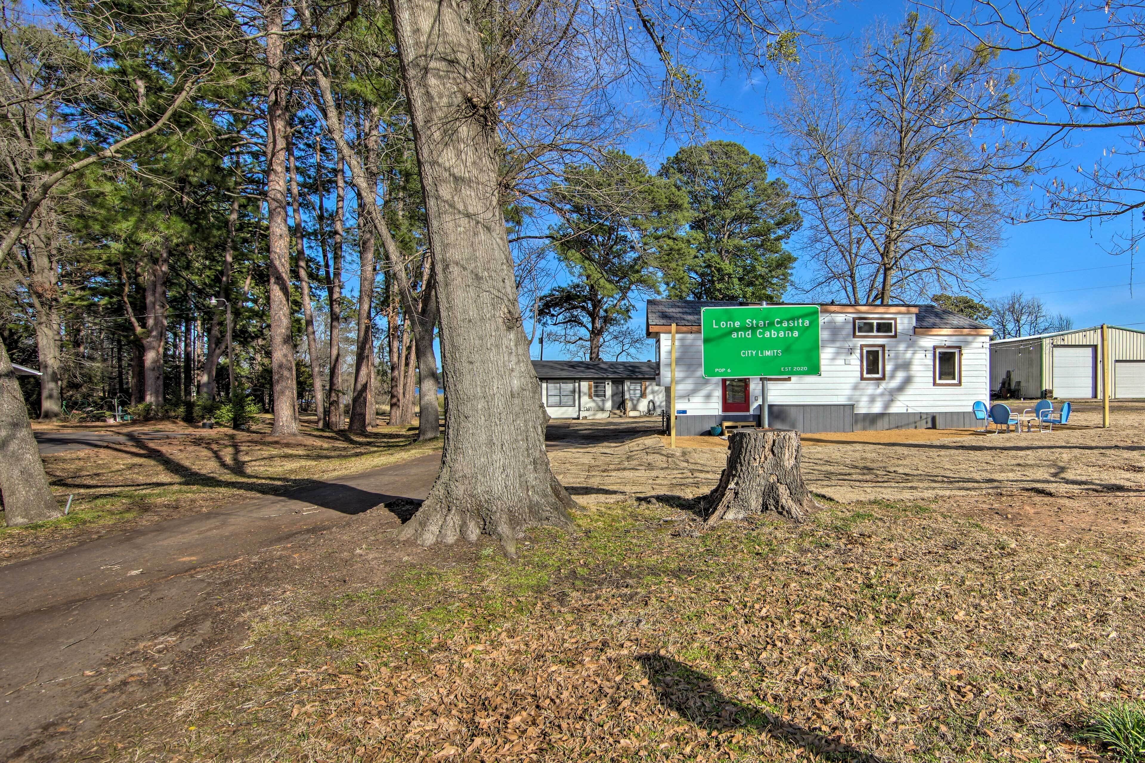 A campground with a sign indicating Lone Star Casa and Cabana City Limits.