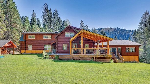 A large log cabin with multiple rooms, a covered porch, and a deck. - Horse Tours + Wildlife: Boise Ranch Home w/ Pool! (Boise)