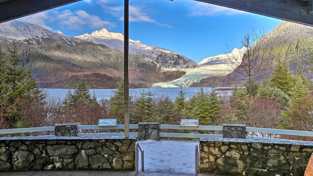 A stone bench area with a view of a glacier and mountains. - Expansive Getaway ~ 2 Miles to Mendenhall Glacier! (Juneau)