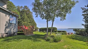 A modern house with a deck and a view of a lake. - Plattsburgh Home w/ Deck on Lake Champlain (Plattsburgh)