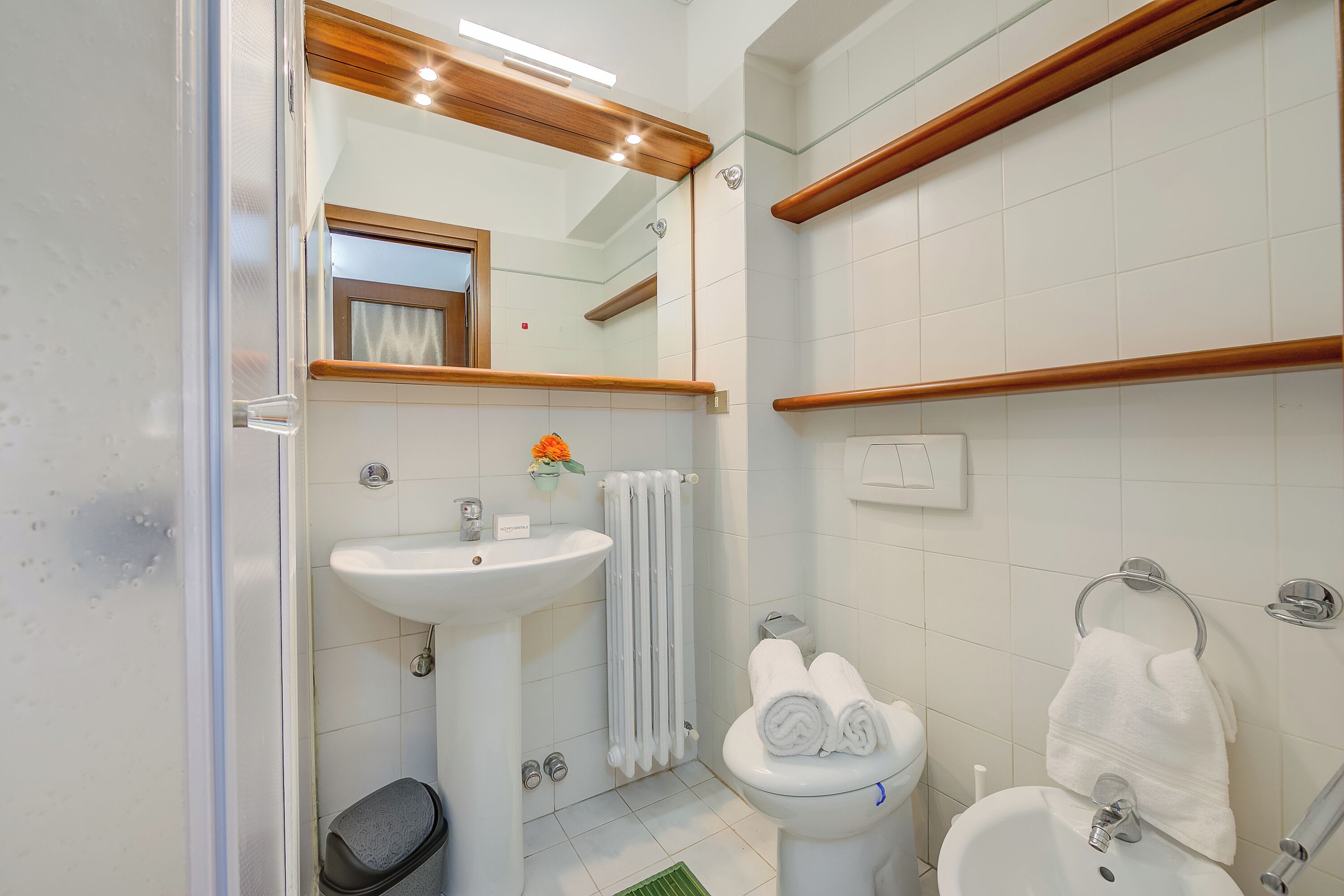 Family Apartment, 2 Bedrooms, Microwave (Leonardo House Garden Stresa Center) | Bathroom | Shower, hair dryer, bidet, towels