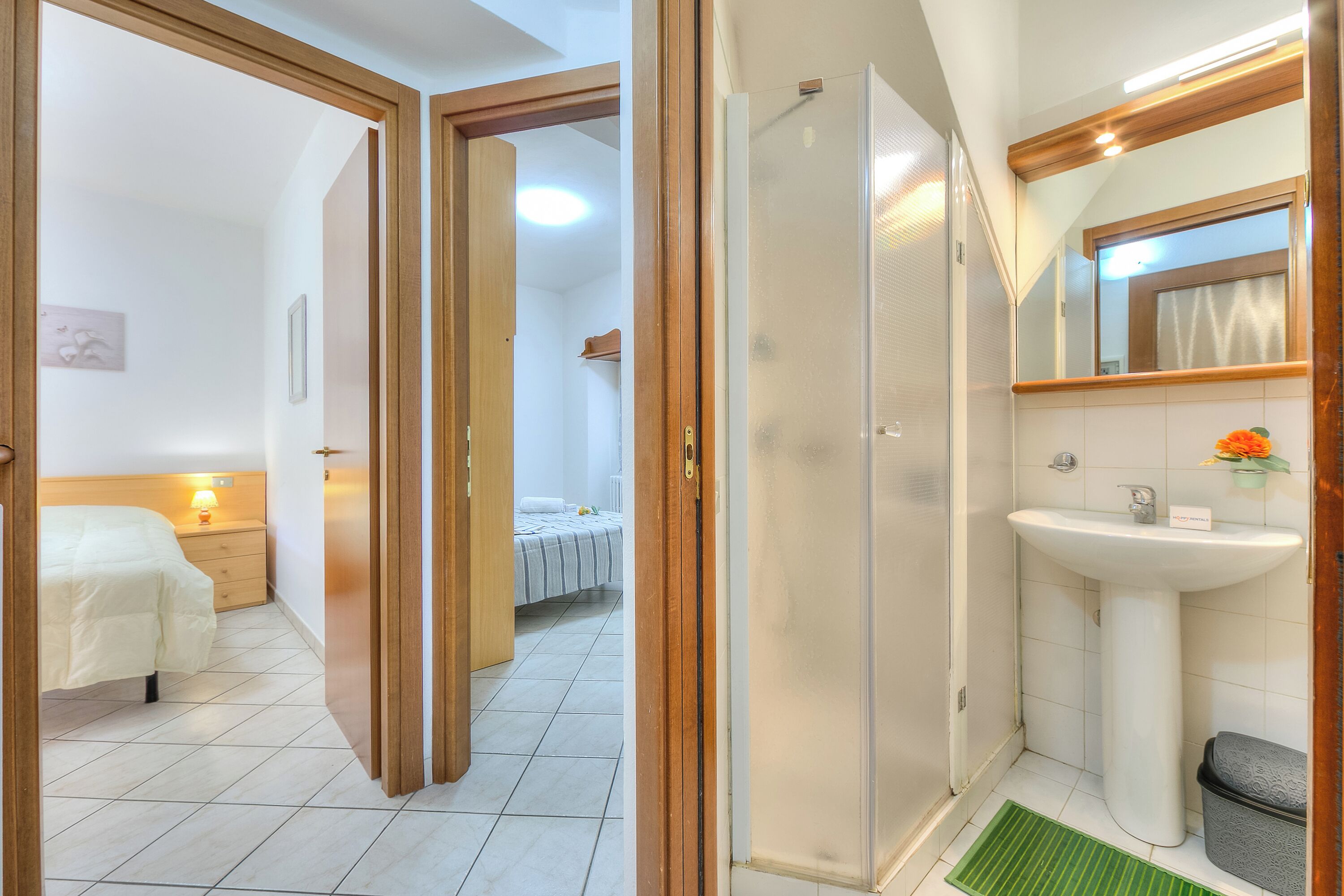Family Apartment, 2 Bedrooms, Microwave (Leonardo House Garden Stresa Center) | Bathroom | Shower, hair dryer, bidet, towels