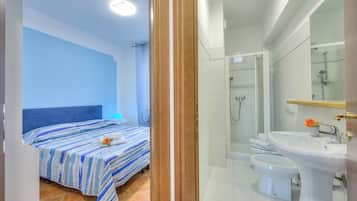 Family Apartment, 2 Bedrooms, Balcony (Riccardo House Stresa 1 min from Lake) | Bathroom | Shower, hair dryer, bidet, towels