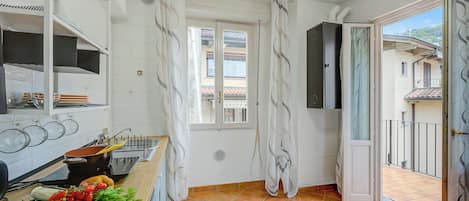 Fridge, microwave, stovetop, espresso maker