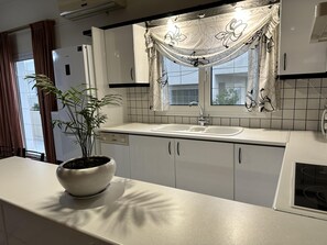 Apartment, Mehrere Betten | Eigene Küche | Kühlschrank, Mikrowelle, Ofen, Herdplatte