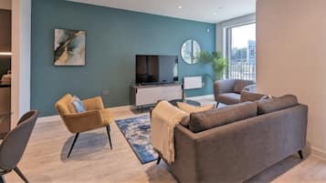 Three Bedroom Townhouse | Living area | 40-inch Smart TV with digital channels, TV