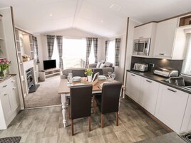 Fridge, electric kettle, toaster, cookware/dishes/utensils