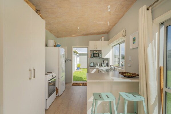 Fridge, microwave, coffee/tea maker, toaster