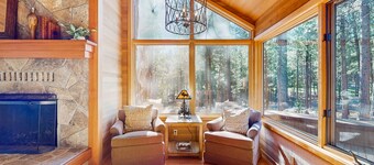 Tree-lined home with private hot tub, 7 pools, 14 tennis courts, golf, gym, AC