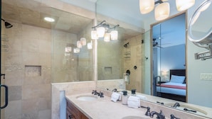 A modern bathroom with two sinks, a large mirror, and a shower area. - OwlMeadows16 3 Bedroom/3 Bath Condo (Telluride)