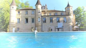 Seasonal outdoor pool, open 8:30 AM to 8:00 PM, pool umbrellas
