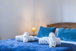 2 habitaciones, tabla de planchar con plancha y cuna de viaje 
