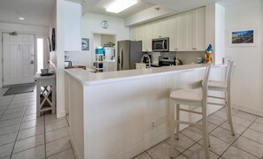 Fridge, microwave, oven, stovetop - Navarre Beach Regency 705 - Nama' Stay At The Beach (Navarre)