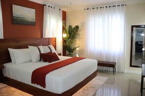 2 chambres, coffres-forts dans les chambres, fer et planche à repasser