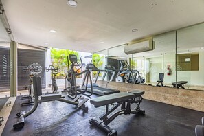 Fitness facility - Stylish 1-bedroom condo steps from Walmart and 5th Avenue (Playa del Carmen)