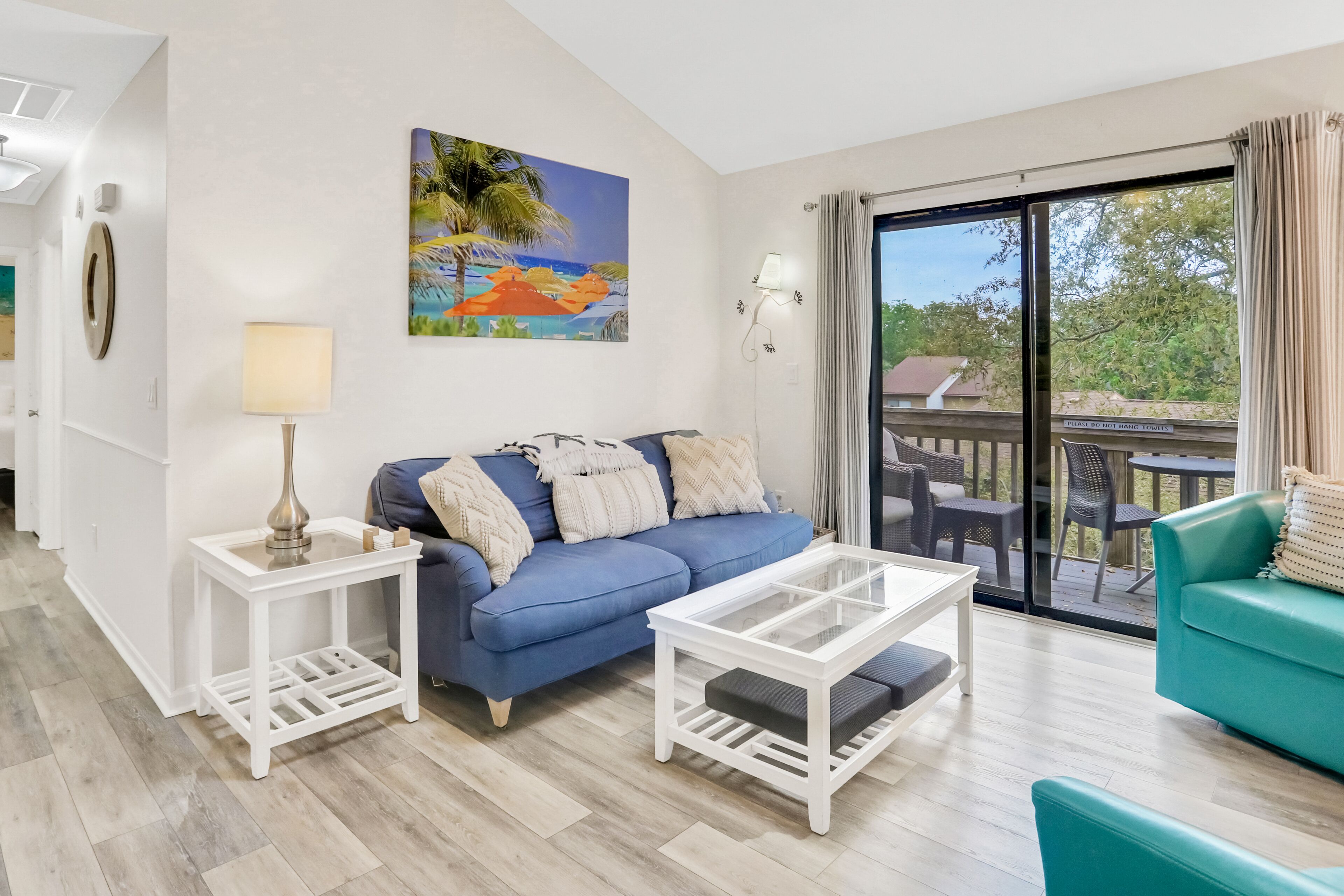 Sunny condo near the beach with pool, tennis court, grill station, & playground