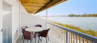Bethany Marina bayfront condo with pool, fireplace, water views