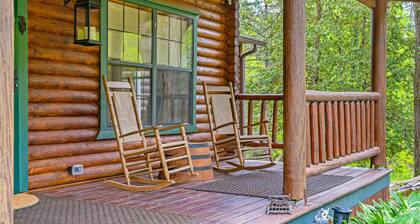 Rustic retreat with mountain views, hot tub, grill, fireplace, central AC, & W/D