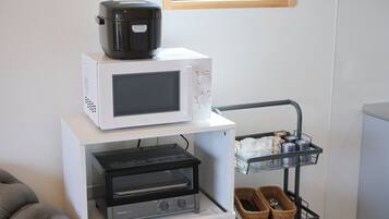 Deluxe Villa | Private kitchen | Full-size fridge, microwave, stovetop, electric kettle
