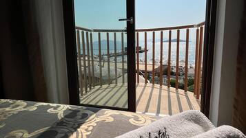 Deluxe Double Room, Sea View | Hypo-allergenic bedding, minibar, in-room safe, desk