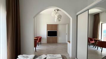 Suite Premium, 1 cama Queen size, vista al mar, frente al mar | Ropa de cama hipoalergénica y minibar