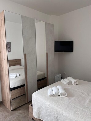 Quadruple Room, 2 Bedrooms, Beach View | Frette Italian sheets, premium bedding, down comforters, in-room safe - La Perla (Pachino)