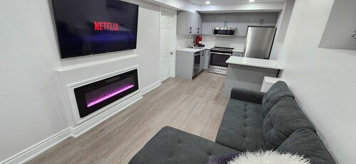 Cozy 2 Bedroom Guest Suite with Electric Fireplace