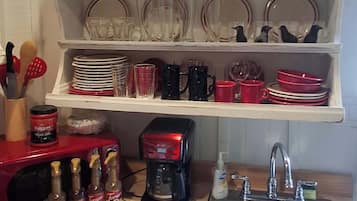 Coffee/tea maker, oven, toaster, cookware/dishes/utensils
