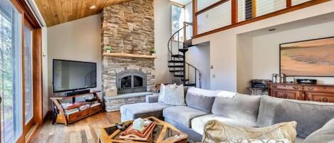 Televisor intel·ligent, reproductor de DVD, llibres i estèreo