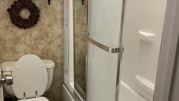 Hair dryer, towels, soap, shampoo