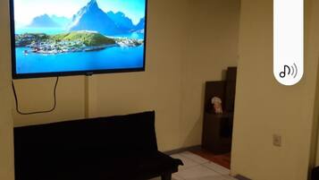 Apartamento City | Zona de estar