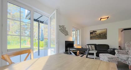 "Urlaub für die Sinne: Entspannende Ferienwohnung im Küstenwald" - Am Küstenwald