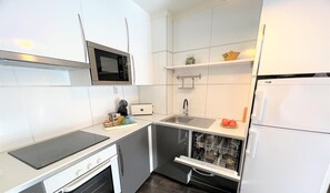 Fridge, microwave, coffee/tea maker, toaster