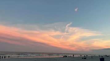 On the beach, sun loungers