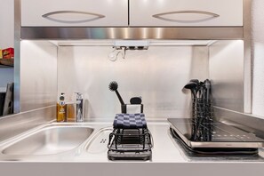 Fridge, microwave, stovetop, coffee/tea maker