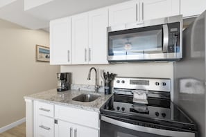 Fridge, microwave, oven, stovetop - Sandcastle Condominiums Unit 217 (Port Aransas)