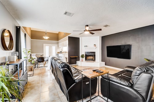 Stylish loft-style condo with private patio, central AC, & W/D - dog-friendly