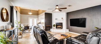 Stylish loft-style condo with private patio, central AC, & W/D - dog-friendly