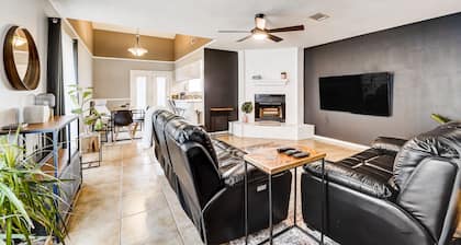 Stylish loft-style condo with private patio, central AC, & W/D - dog-friendly