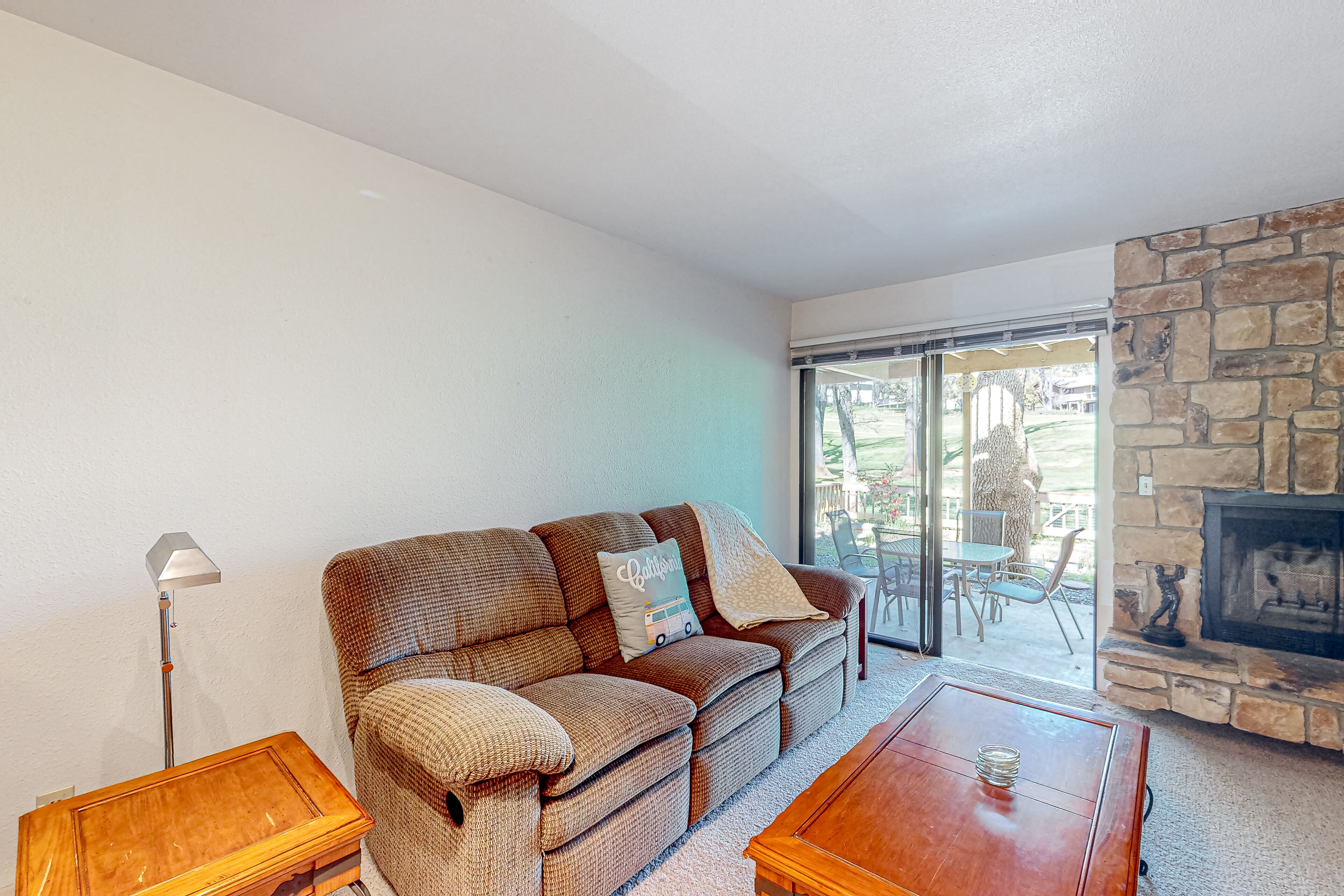 Beautiful home on golf course with fireplace, pool, enclosed patio, W/D, & WiFi