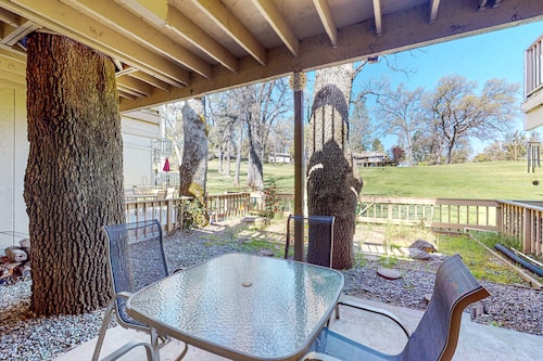 Beautiful home on golf course with fireplace, pool, enclosed patio, W/D, & WiFi